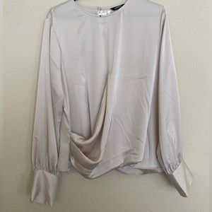 Large NEW Tags on express champagne blouse. never worn.